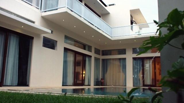 Pasific Beach Cottages Mangsit Camera foto