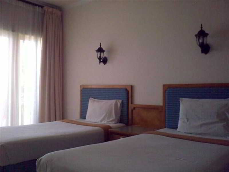 Pasific Beach Cottages Mangsit Esterno foto