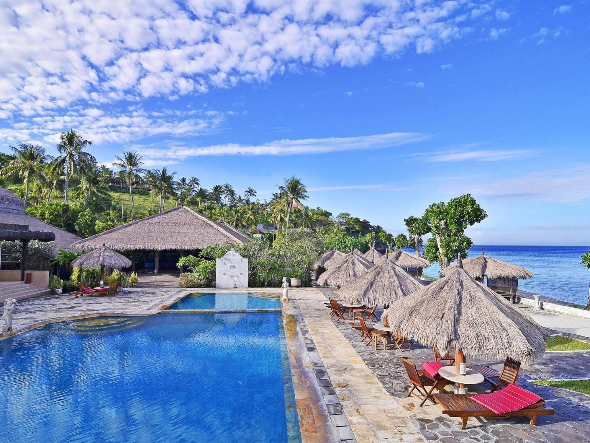 Pasific Beach Cottages Mangsit Esterno foto