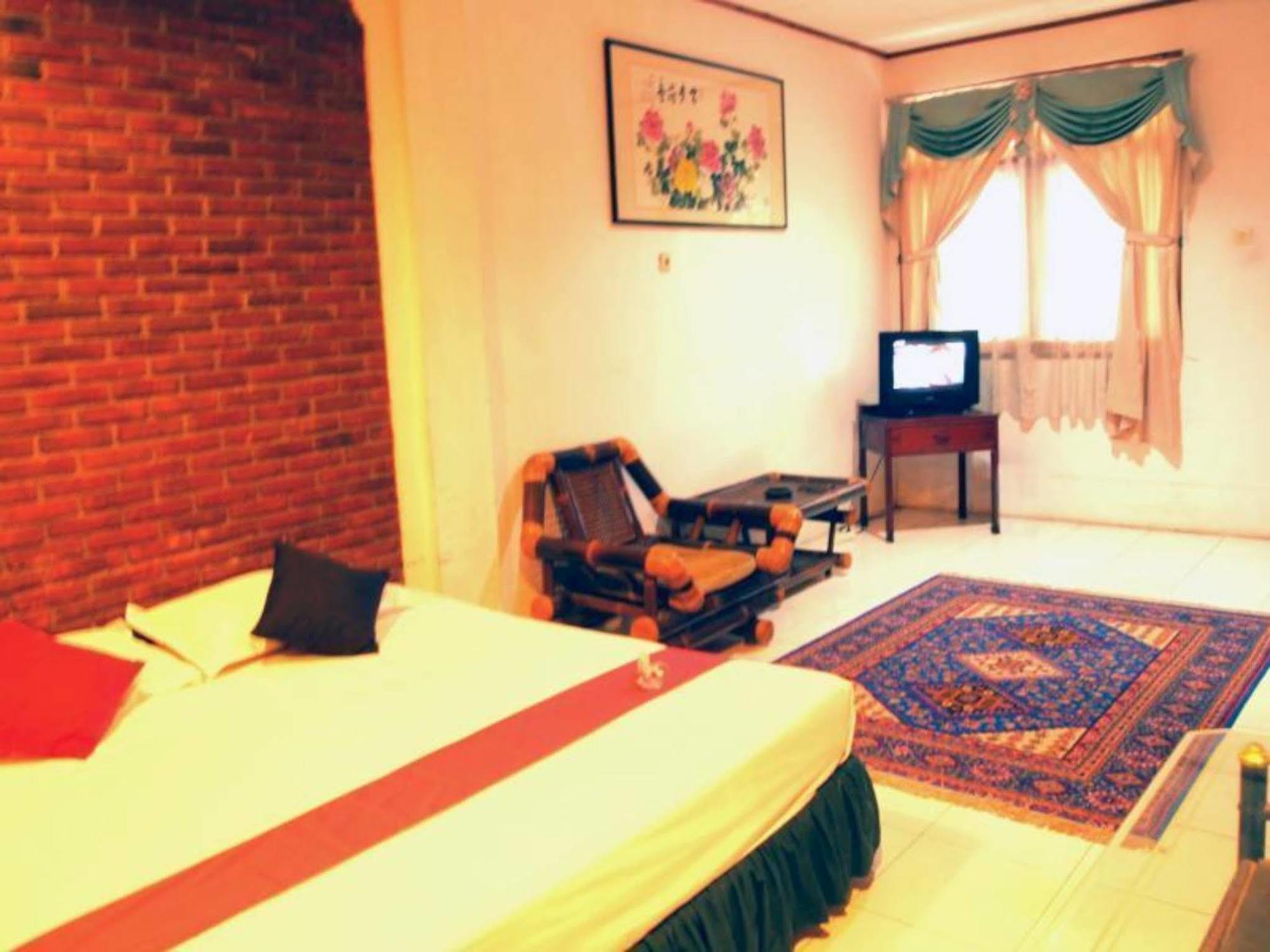 Pasific Beach Cottages Mangsit Esterno foto