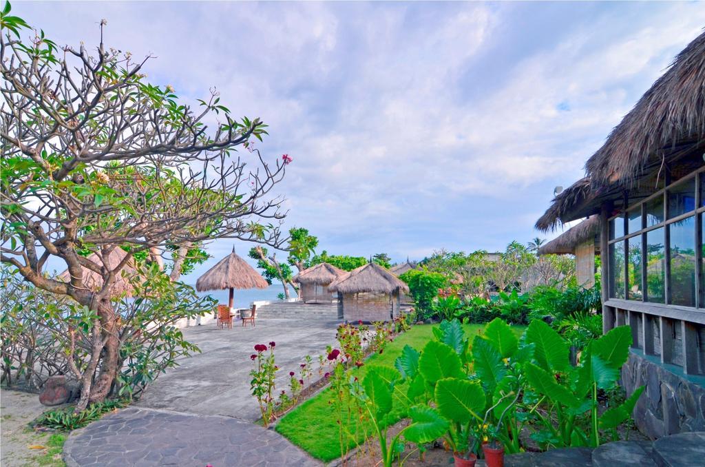 Pasific Beach Cottages Mangsit Esterno foto
