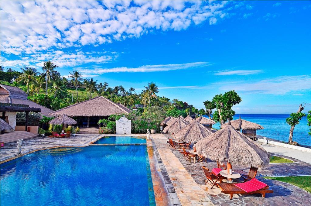 Pasific Beach Cottages Mangsit Esterno foto