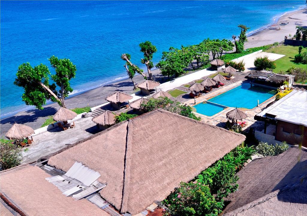 Pasific Beach Cottages Mangsit Esterno foto