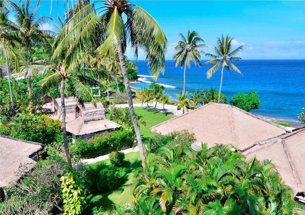 Pasific Beach Cottages Mangsit Esterno foto